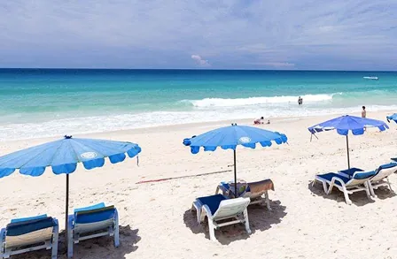 Loungers and parasols on the sand at Kata