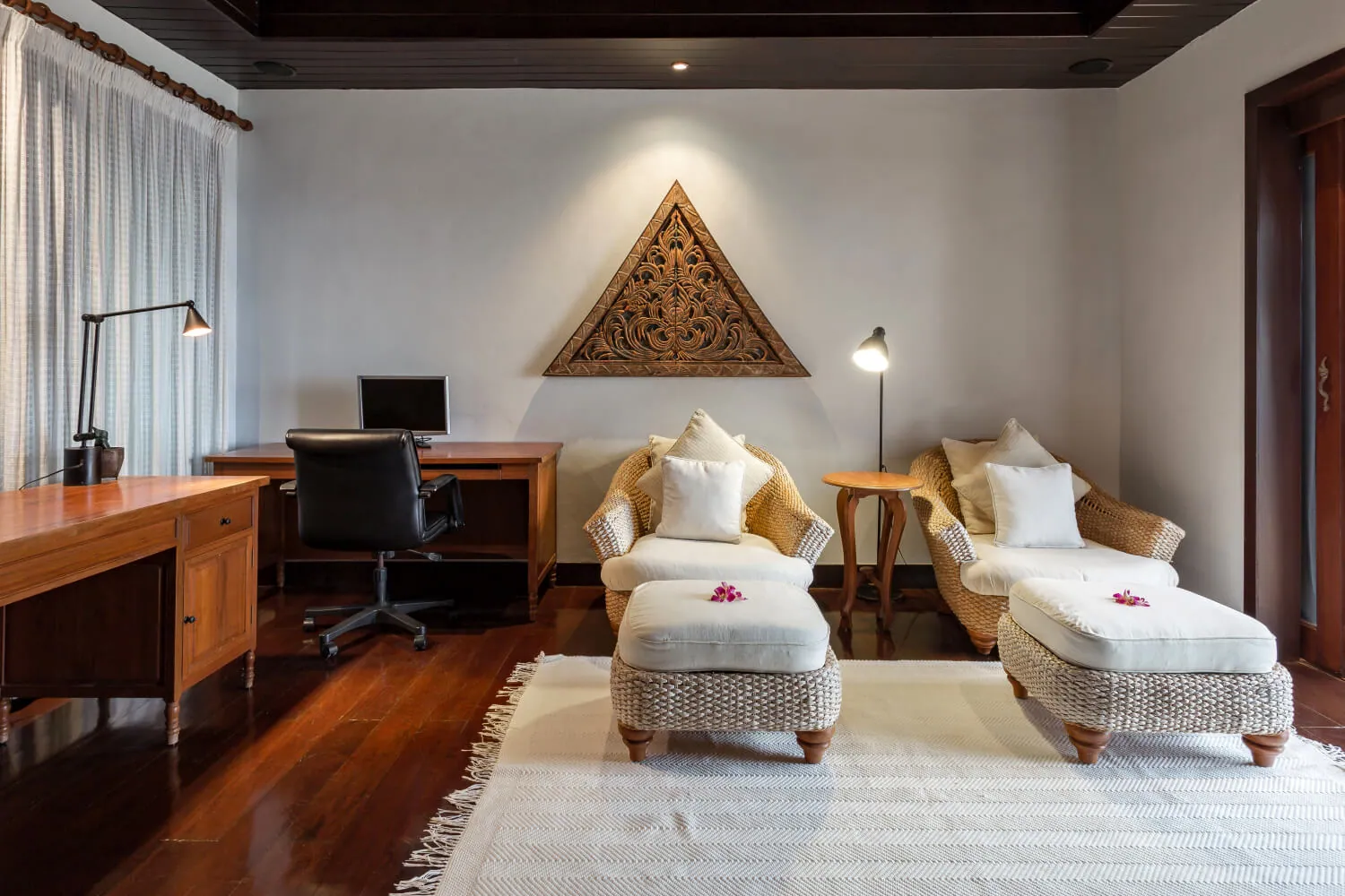 The master suite's study with its carved Thai pediment