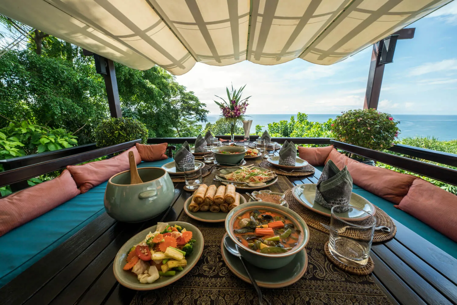 Lunch laid out at the shaded outdoor dining table
