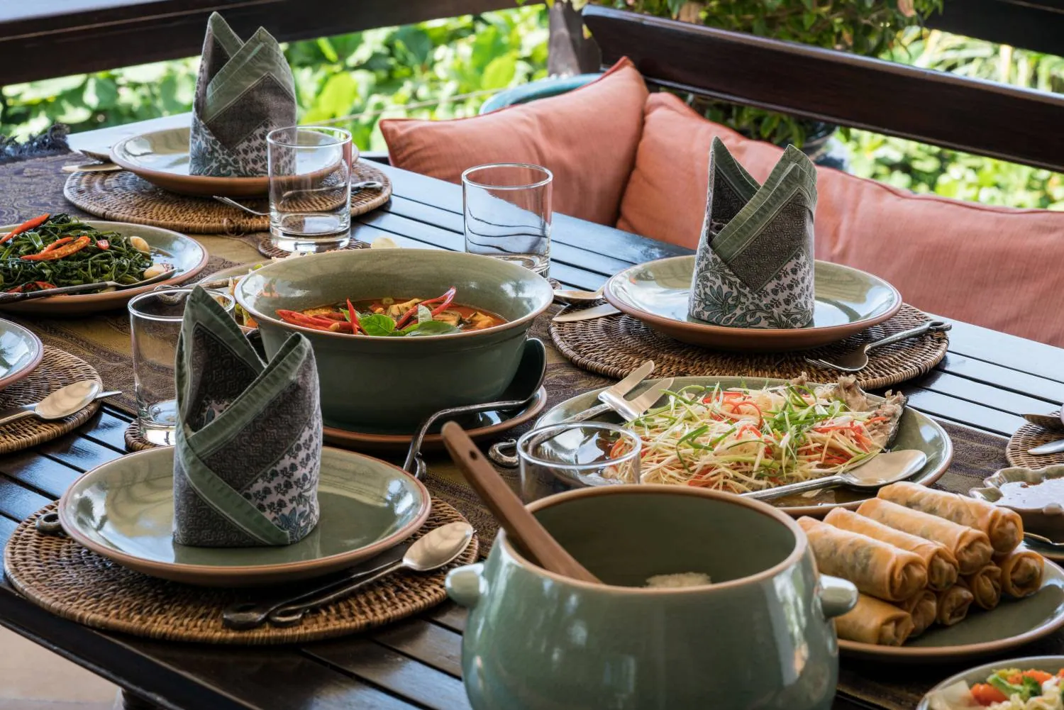 A Thai lunch laid out on the outdoor table