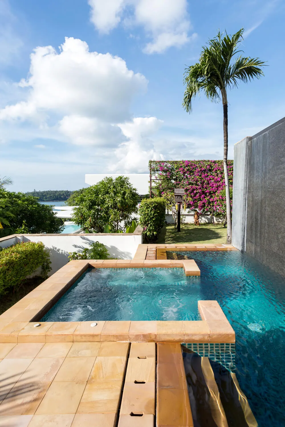 The upper pool and fountain on the sandstone deck